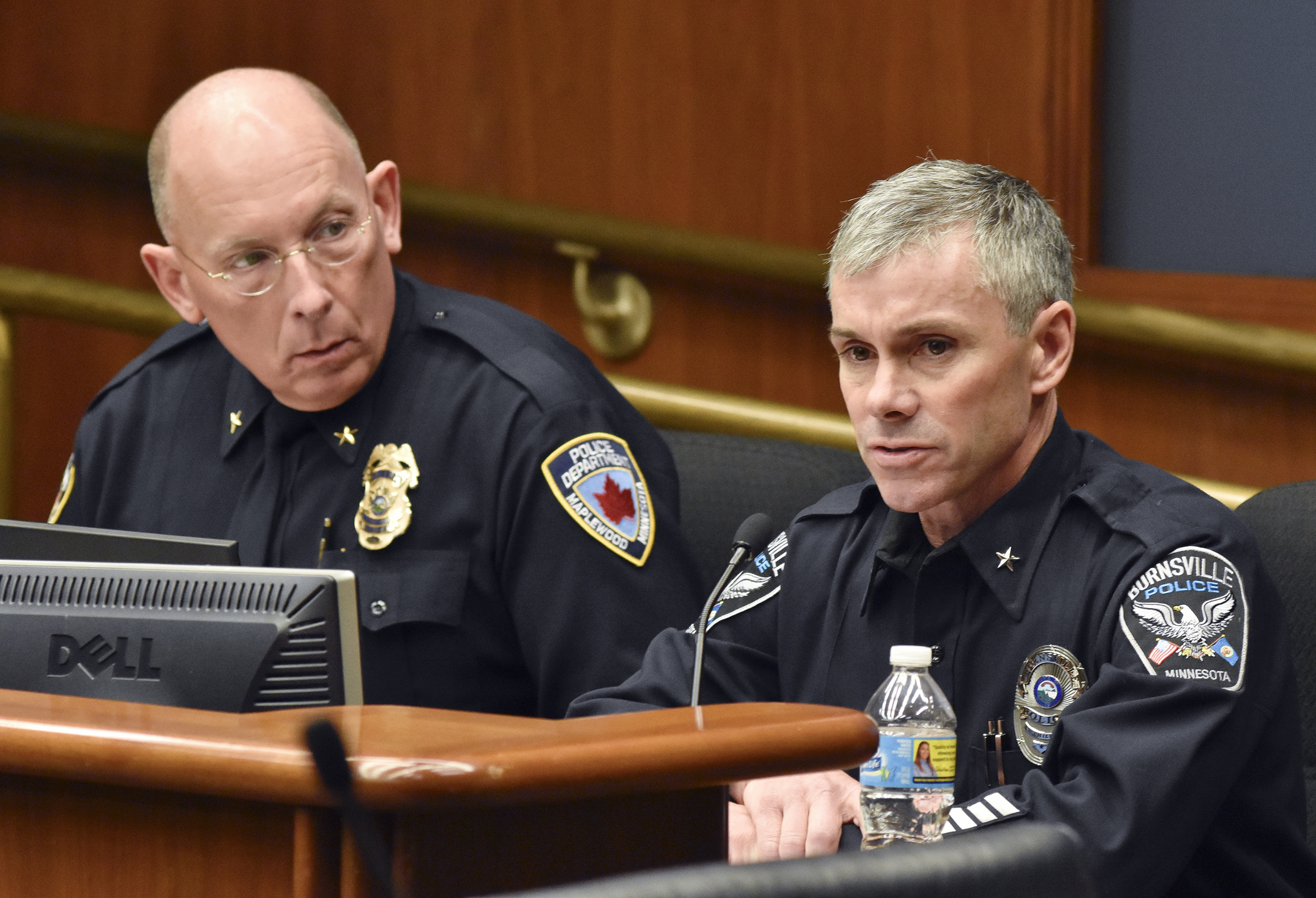 Maplewood Police Chief Paul Schnell, left, and Burnsville Police Chief Eric Gieseke testify on law enforcement use of body cameras during the Dec. 1 meeting of the Legislative Commission on Data Practices. Photo by Andrew VonBank